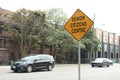 senior citizens centre yellow diamond sign in black writing with black border. p