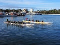 Senior Citizens Paddling Long Canoes