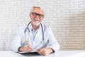 Headshot of senior male doctor, video call Royalty Free Stock Photo