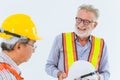 Senior construction engineers worker talking together happy smile working Royalty Free Stock Photo