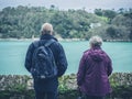 Senior couple admiring view of river Royalty Free Stock Photo