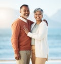 Senior couple, beach portrait and smile with hug, care and bonding for love, romance and vacation by sea. Mature man Royalty Free Stock Photo
