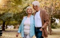 Senior couple, bonding or walking in nature park, city garden or public environment in relax exercise, mobility or Royalty Free Stock Photo