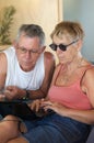 Senior couple browsing computer Royalty Free Stock Photo