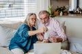 Senior couple checking their bills, concept of family finance. Royalty Free Stock Photo