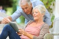 Senior couple connected on wifi with tablet Royalty Free Stock Photo