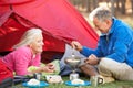Senior Couple Cooking Breakfast On Camping Holiday Royalty Free Stock Photo