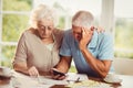 Senior couple counting bills Royalty Free Stock Photo