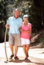 Senior couple on country walk Royalty Free Stock Photo