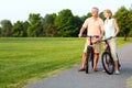 Senior couple cycling