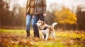 Senior couple with dog on a walk in an autumn nature. Generative AI Royalty Free Stock Photo