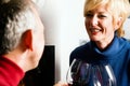 Senior couple drinking red wine Royalty Free Stock Photo