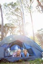 senior couple elongating inside their tent