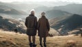 Senior couple embraces love on mountain peak generated by AI