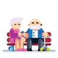 Senior couple embracing sitting on bench. Retired elderly couple in love Royalty Free Stock Photo