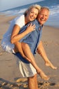 Senior Couple Enjoying Beach Holiday Royalty Free Stock Photo