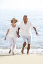Senior Couple Enjoying Beach Holiday Royalty Free Stock Photo