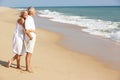 Senior Couple Enjoying Beach Holiday in the sun Royalty Free Stock Photo