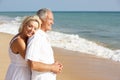 Senior Couple Enjoying Beach Holiday In The Sun Royalty Free Stock Photo