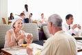Senior Couple Enjoying Breakfast In Hotel Restaurant Royalty Free Stock Photo