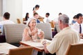 Senior Couple Enjoying Breakfast In Hotel Restaurant Royalty Free Stock Photo