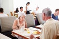 Senior Couple Enjoying Breakfast In Hotel Restaurant Royalty Free Stock Photo