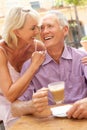 Senior Couple Enjoying Coffee And Cake Royalty Free Stock Photo