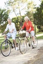 Senior Couple Enjoying Cycle Ride Royalty Free Stock Photo