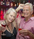 Senior Couple Enjoying Drink In Bar Royalty Free Stock Photo