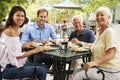 Senior Couple Enjoying Meal At Outdoor Cafe Royalty Free Stock Photo