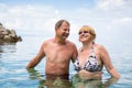 Senior couple enjoying the retirement on a seacost