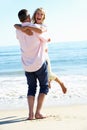 Senior Couple Enjoying Romantic Beach Holiday Royalty Free Stock Photo