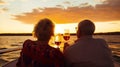 senior couple enjoying sunset from sailing boat Royalty Free Stock Photo