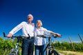 Senior couple enjoying view on bike trip