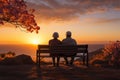 Senior couple enjoys a peaceful sunset on a bench, embodying enduring love