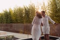 Senior couple enjoys on the terrace of a luxury house during the holidays. Selective focus Royalty Free Stock Photo