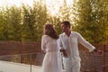 Senior couple enjoys on the terrace of a luxury house during the holidays. Selective focus Royalty Free Stock Photo