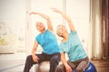 Senior couple exercising at home Royalty Free Stock Photo