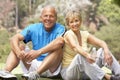 Senior Couple Exercising In Park Royalty Free Stock Photo