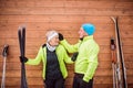 Senior couple getting ready for cross-country skiing. Royalty Free Stock Photo