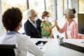 Senior couple with grandaughter at black female doctor Royalty Free Stock Photo