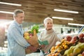 Senior Couple Grocery Shopping at Farmers Market Royalty Free Stock Photo