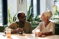 Senior couple having date in cafe Royalty Free Stock Photo