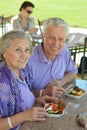 Senior couple having lunch Royalty Free Stock Photo