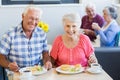 Senior couple having lunch together Royalty Free Stock Photo