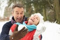Senior Couple Having Snowball Fight Royalty Free Stock Photo