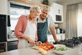 Senior couple, healthy food and cooking lunch together in Australia kitchen at home. Happy woman, hungry man and Royalty Free Stock Photo