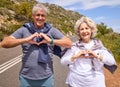 Senior couple, heart hands and fitness outdoor on road, love icon and portrait with smile, workout or health. Mature Royalty Free Stock Photo