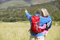 Senior Couple On Hike Through Beautiful Countryside Royalty Free Stock Photo