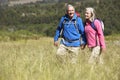 Senior Couple On Hike Through Beautiful Countryside Royalty Free Stock Photo